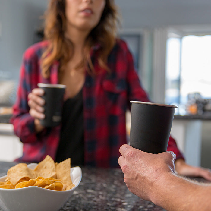 16oz-pint-cup-q0 16ounce_steel_pint_cup_black_party_lifestyle_e7c4b89f-bee2-44df-bb63-bc286febb421.jpg