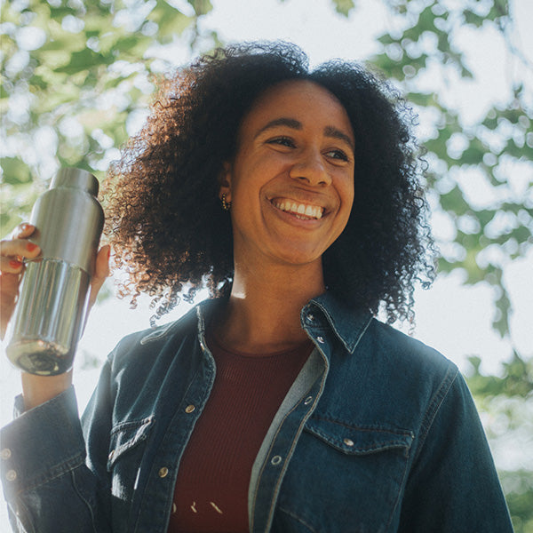 bring-your-own-party-kit-tumblers-and-cocktails-d8 16oz_rise_reflect_woman_smile_square.jpg