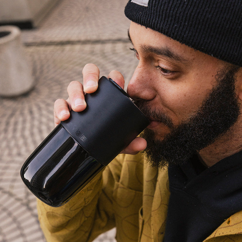 16oz-rise-tumbler-z0 16oz_rise_tumbler_black_man_drink_square.jpg