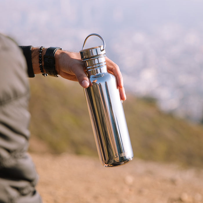27oz-reflect-with-bamboo-cap-s7 K27SSLRF-MS-BAMBOO_reflect_bottle_hand_lifestyle.jpg
